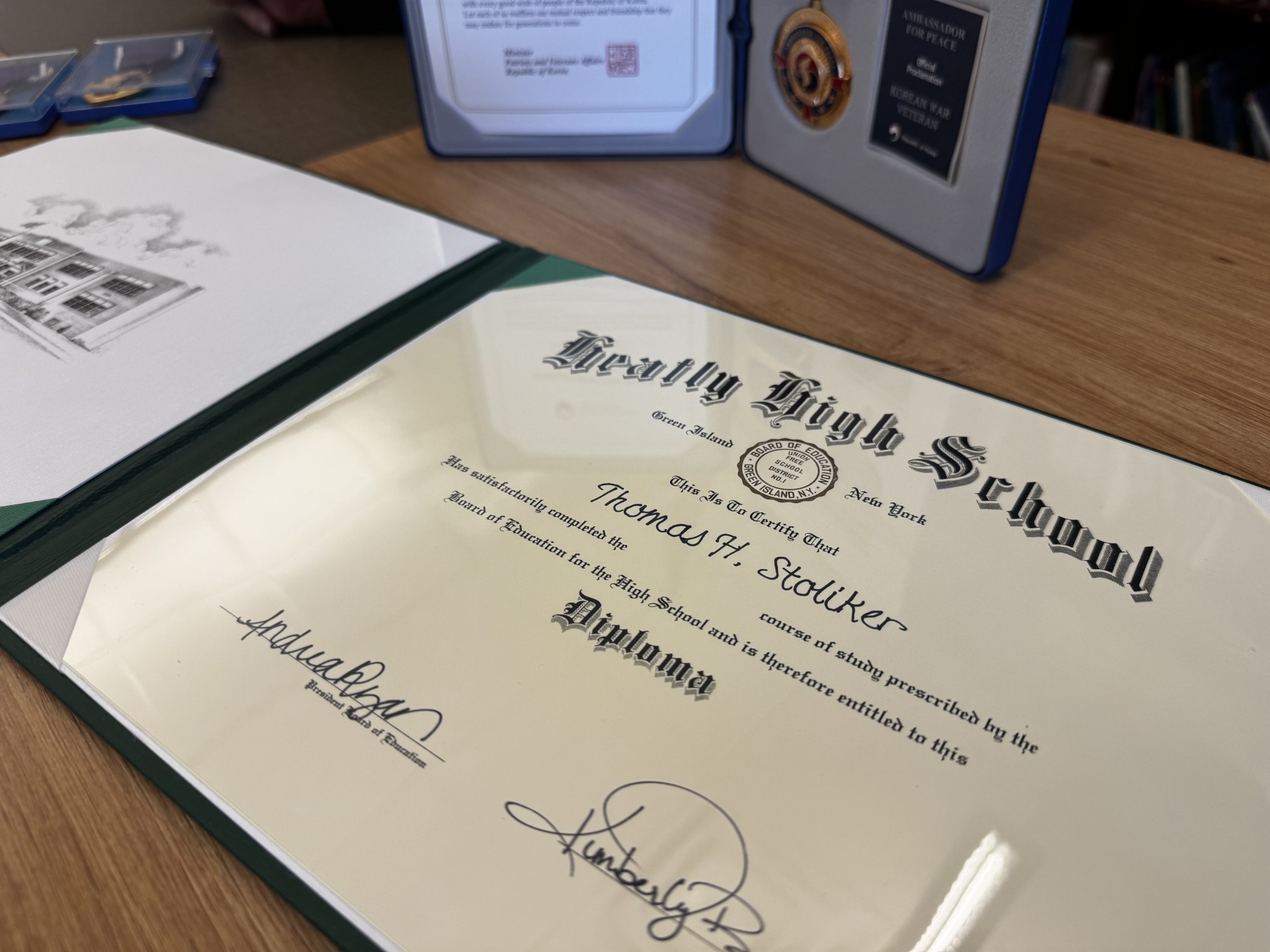 Honorary High School Diploma awarded to Thomas H. Stoliker by Green Island UFSD prior to the new tuitioning program of high school students to Watervliet CSD.